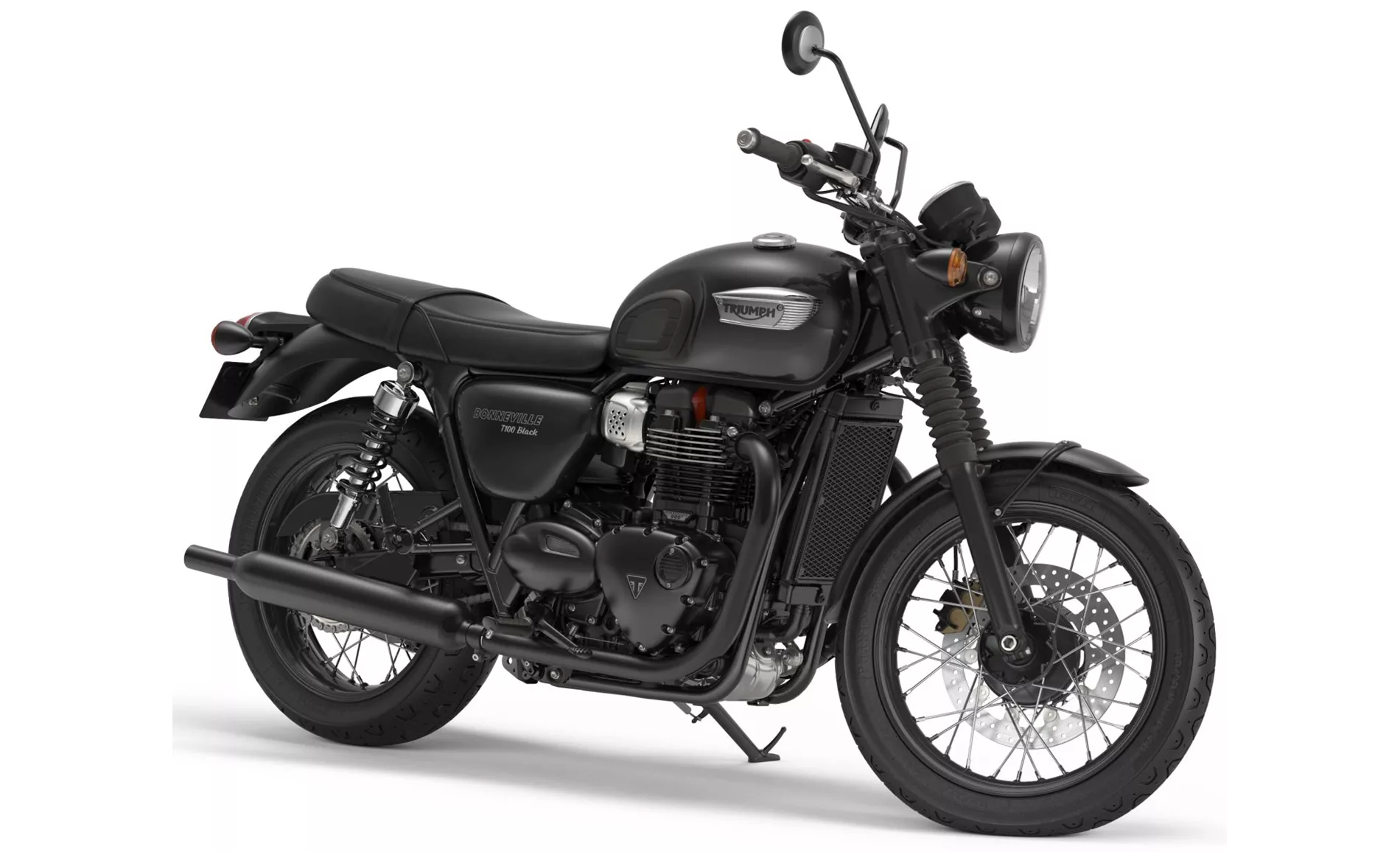Triumph Bonneville T100 / Black (2017–2020) authentic motorcycle studio photo, viewed diagonally from the front on a white background