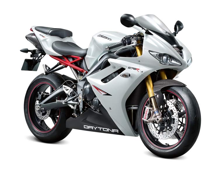 Triumph Daytona 675 R (2011–2012) authentic press photograph of motorcycle, white background, diagonal front view