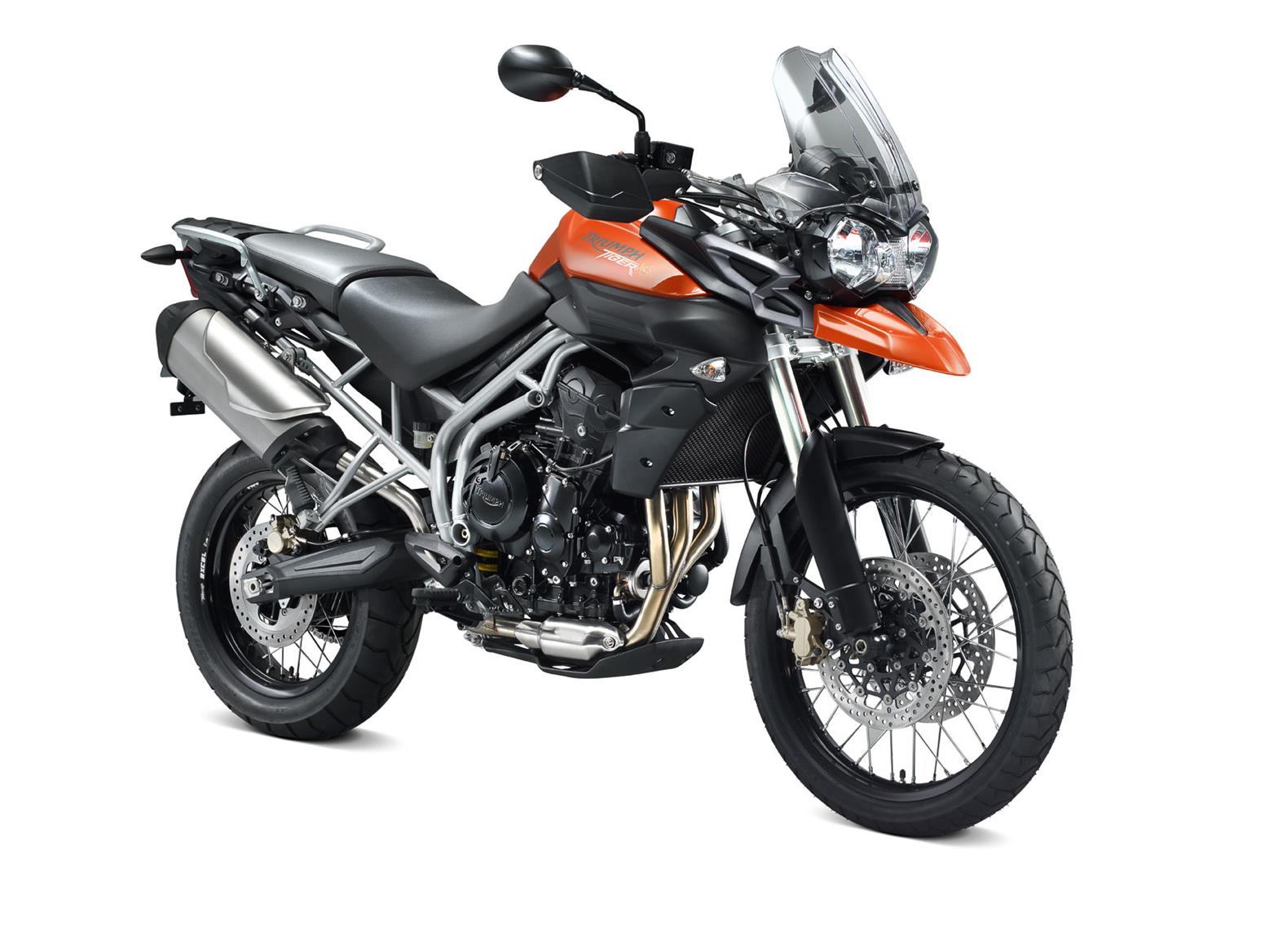 Triumph Tiger 800 XC (Cross Country) 2011–2014, real motorcycle factory image angled towards the front on a white backdrop