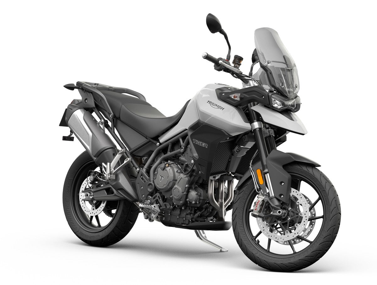 Triumph tiger-900-base-2020 real current-generation motorcycle studio front three quarter photo on white backdrop