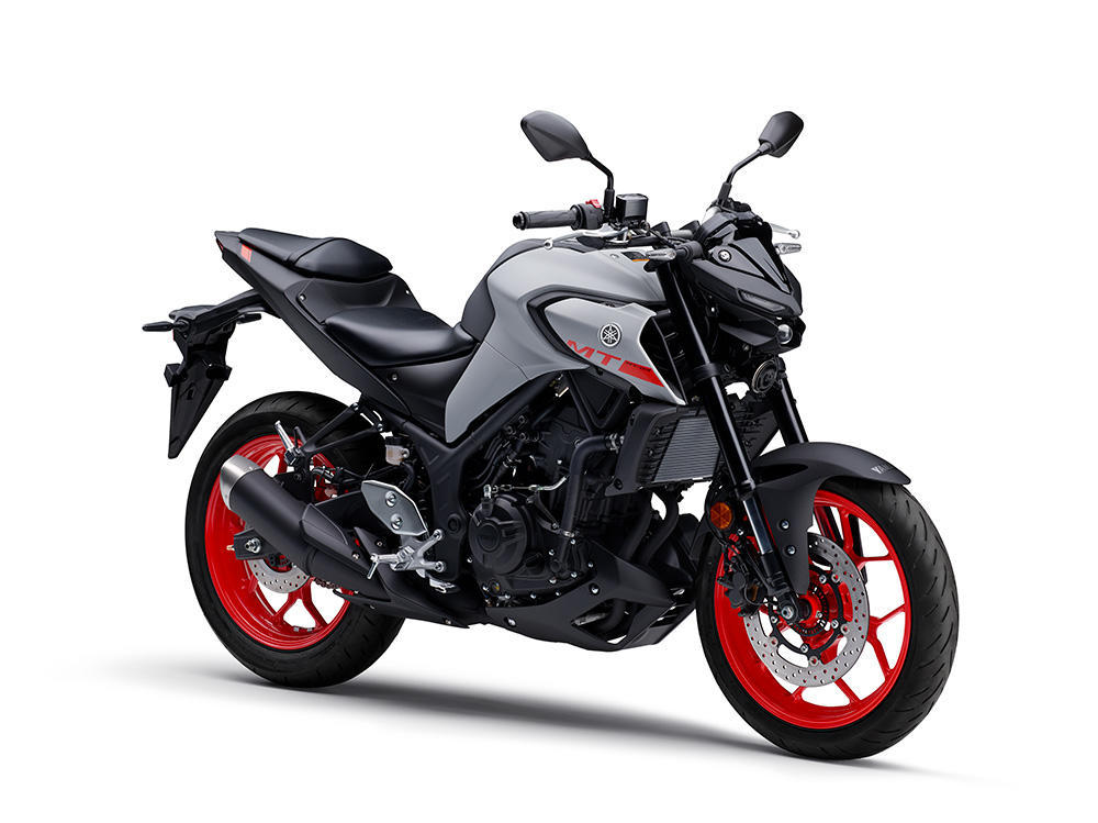 Yamaha MT-03 321 (2020+) real motorcycle studio press photo, white background, front three-quarter perspective