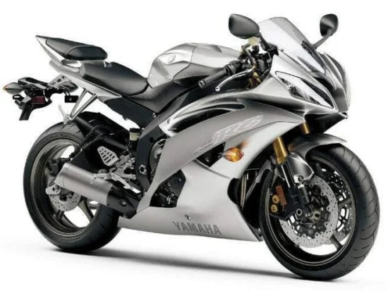 Original Yamaha YZF-R6 2008 generation photographed on a white studio background, three-quarter front angle