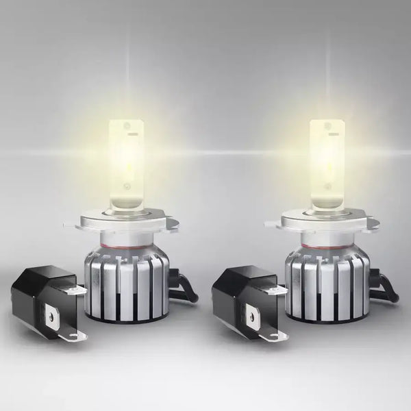 OSRAM LEDriving® HL VINTAGE H4 Warm White LED bulbs emitting 2700K light, showcasing halogen look with modern LED performance.